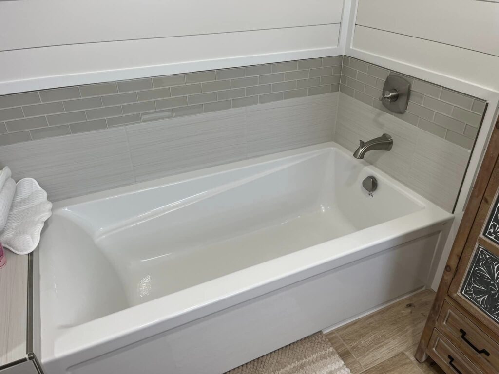 This image features a white bathtub.